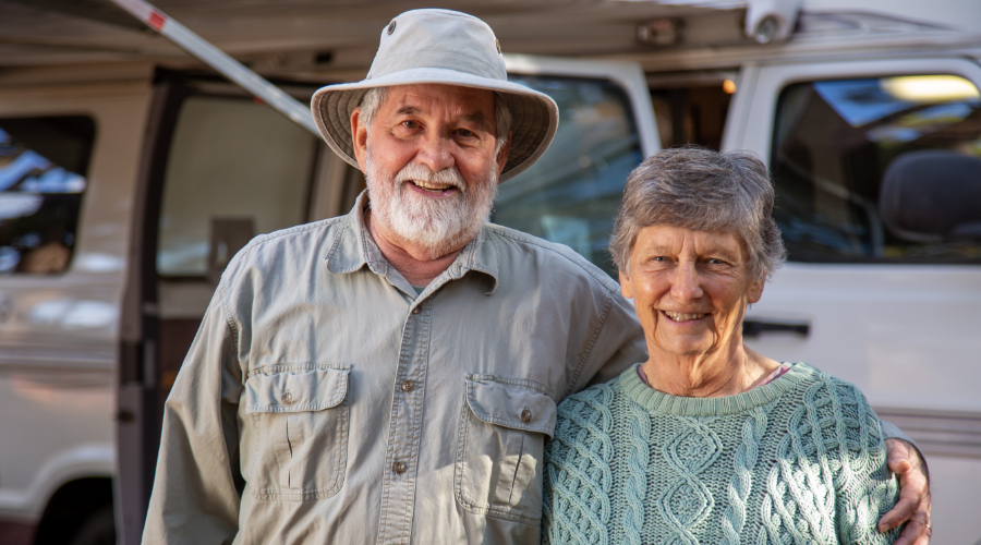 Smiling members enjoying camping and the outdoors.