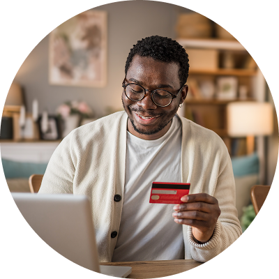 Man paying his credit card bill online.