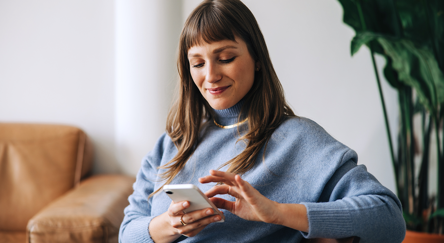 Women sitting down on her phone