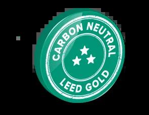 Graphic featuring the "Carbon Neutral" and "LEED Gold" logos, symbolizing sustainability and eco-friendly practices in construction and design.