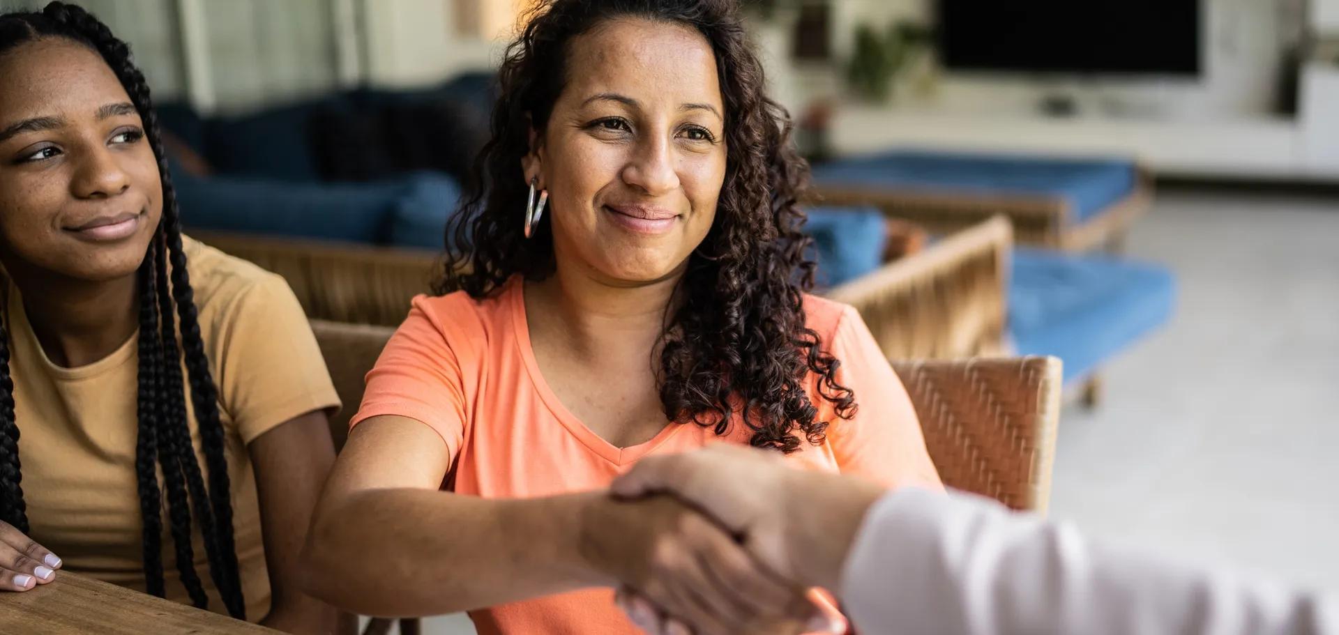 Woman finding the assistance she needed to purchase a home for her family.