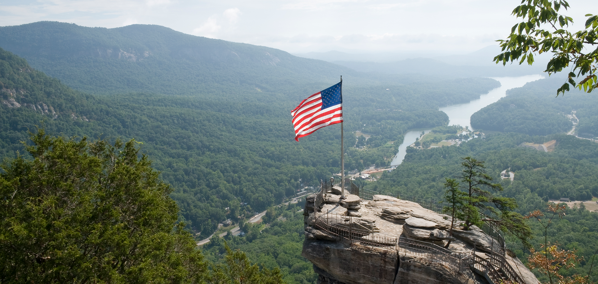 Chimney Rock State Park with a waving American flag