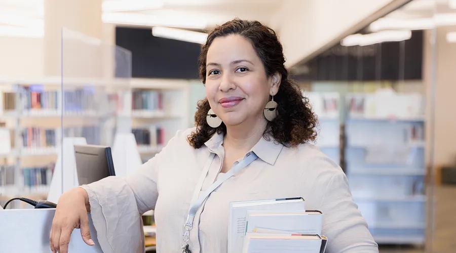 Woman volunteering at her local library