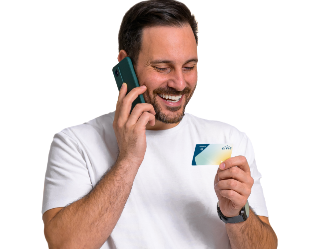 A gentleman on the phone with Visa, exploring all the benefits Visa offers.