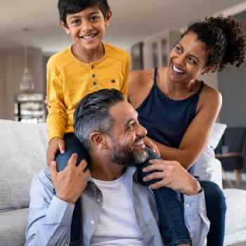 Family enjoying some time together after shopping and earning rewards with the Civic Rewards Credit Card. 