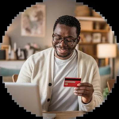 Man paying his credit card bill online.