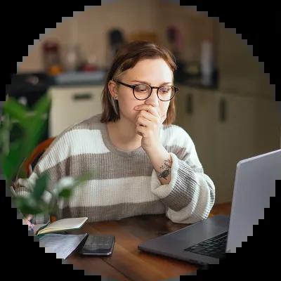 Young woman applying for jobs on her laptop. 