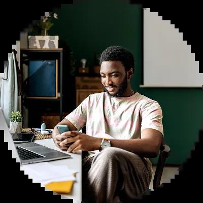 Young guy reading news on the stock market.