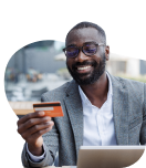 Business owner holding his Civic Business Reward Credit Card while purchasing online.