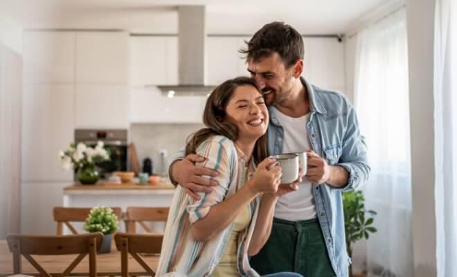 Happy couple enjoying their new home purchased with the Civic adjustable rate mortgage.