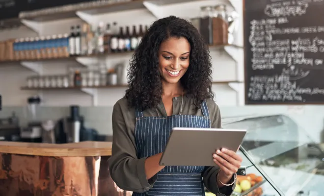 Business owner looking at all the digital tools Civic offers to manage her Civic Business Choice Certificate.