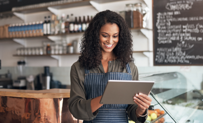 Business owner looking at all the digital tools Civic offers to manage her Civic Business Choice Certificate.