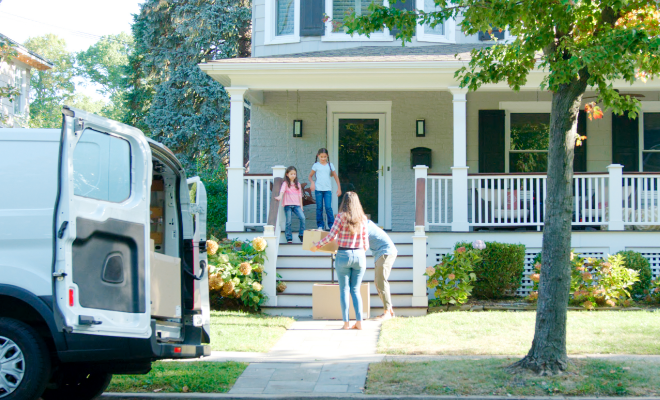 Family moving into their new home.