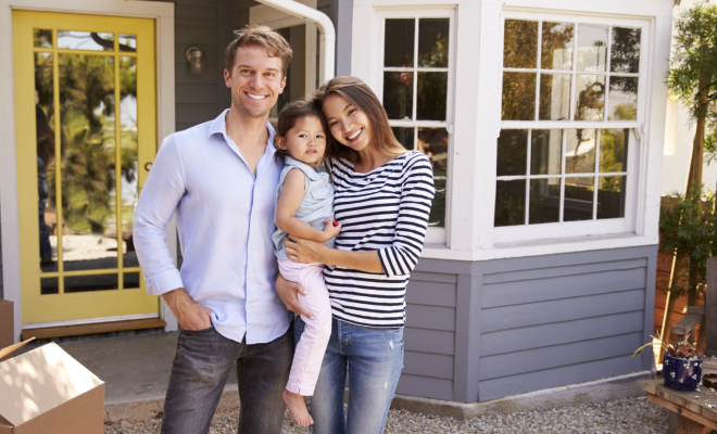 First-time homebuyer family moving into new home purchased with a Civic mortgage.