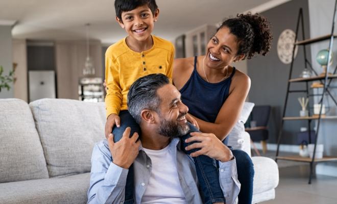 Family enjoying some time together after shopping and earning rewards with the Civic Rewards Credit Card. 