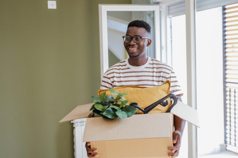 Young man moving into his first home thanks to a Civic Mortgage.