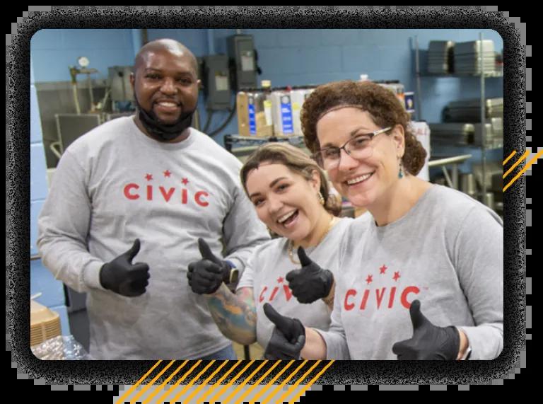 three civic employees giving thumbs up